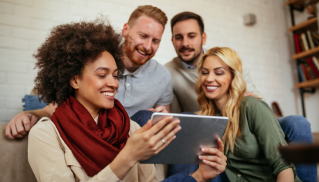 ICU Day Contest Referral Entry - Group of friends looking at tablet