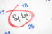 Calendar with Pay Day noted and circled