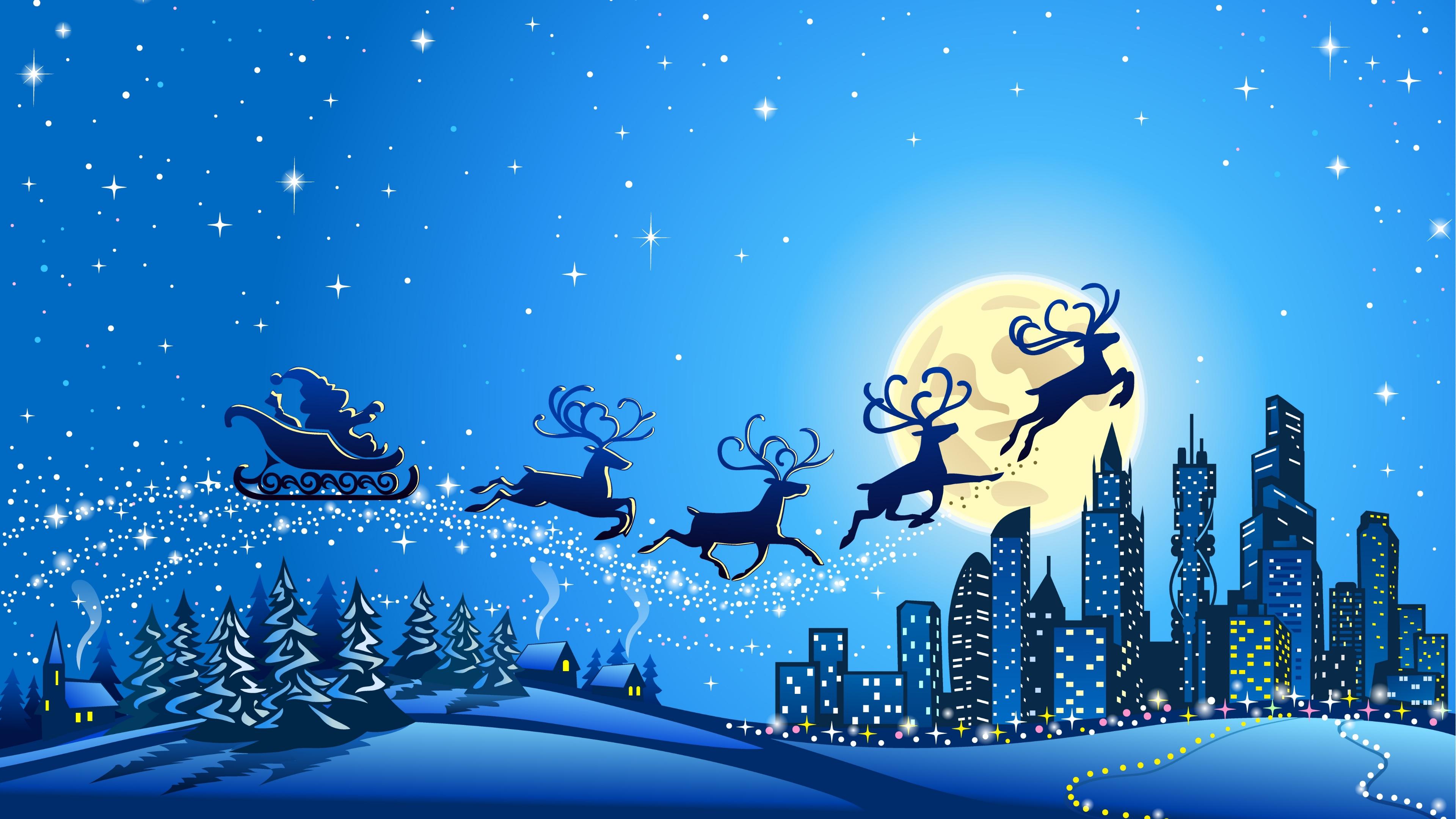 Snowy city image with sleigh and reindeer flying over