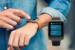 AFFCU Smart Watch App - Person using watch on arm